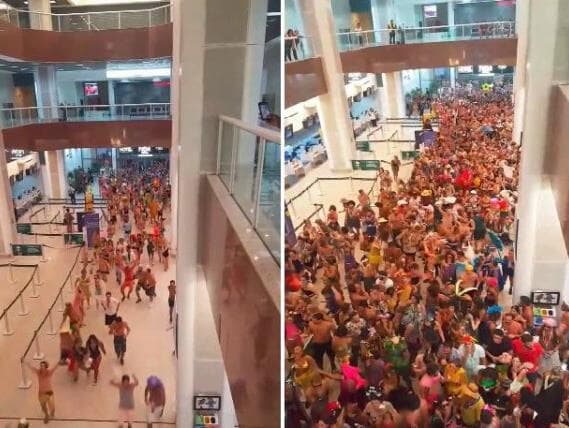 Multidão de foliões ocupa Aeroporto Santos Dumont e protesta contra Temer e Crivella; veja o vídeo