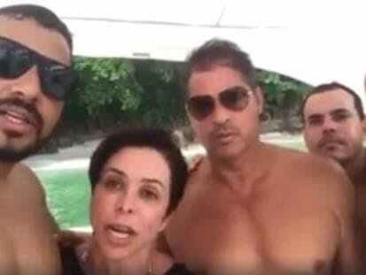 Na praia, cercada de amigos sem camisa, Cristiane Brasil "jura" inocência em condenação trabalhista